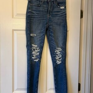 American Eagle Outfitters Ripped AE Next Level Super High Waisted Jegging